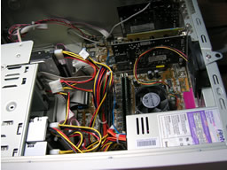 Looking down towards the cards at the bottom of the case. Motherboard covers entire far side of case.