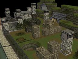 Click to view large image Chain-link fence, guard towers and tall cliffs surround military buildings and supplies.