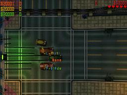 Click to view large image 3 players spin their wheels away from the start lights of a race.